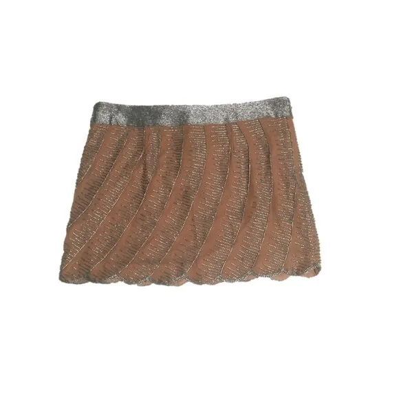 NWT 100% Silk beige mini skirt with silver embellishments L gladiator scallop